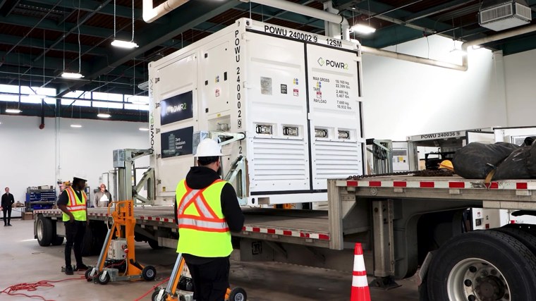 On location: a POWRBANK MAX loading for delivery, one frame from a decade of video shoots.
